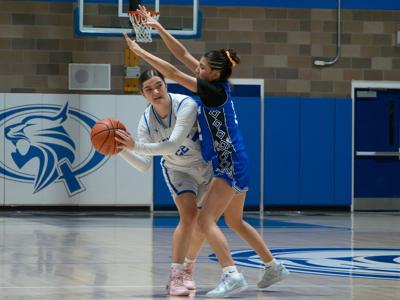 Questa's Kamrym Cardenas against Lady Hawk Gianna Carrillo